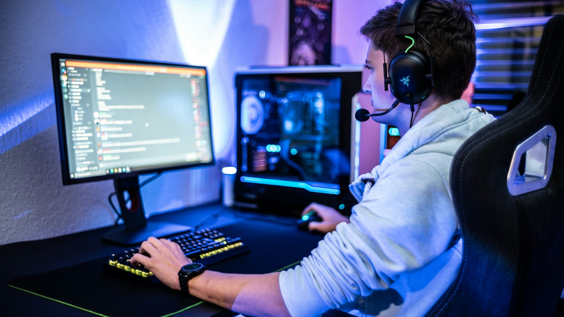 QuantumValorForge esports arena with players at competition stations